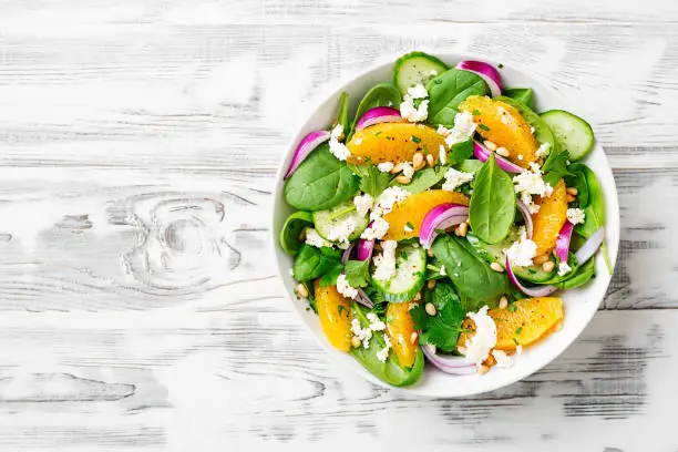 Photo of Fresh spinach salad with oranges
