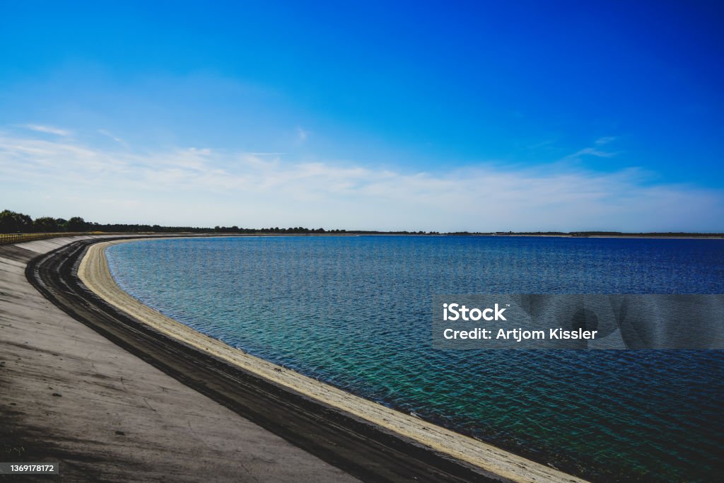 A water reservoir in Germany. Dam Stock Photo