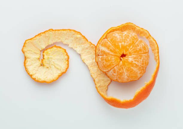 istock Ripe mandarines close-up on a white background. Tangerines  on a white background. 1369178443