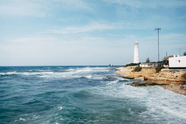 istock Landscape with a Lighthouse at Cape Tarkhankut in Crimea. 1369182102