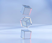 3d render, glass or plastic cubes flying in different angles on blue texture background. Clear square boxes of acrylic or plexiglass, crystal block set, realistic mockup glowing geometric objects