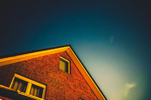 A house top in the starry sky.