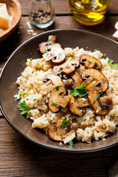 istock Risotto with brown champignon mushrooms 1369183333