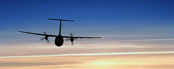 istock propeller airplane taking off at sunset 136918851