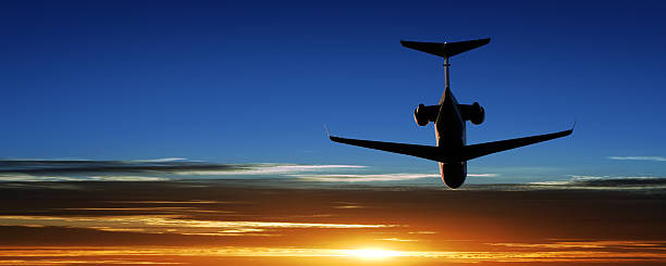 istock corporate jet airplane taking off at sunset 136918876