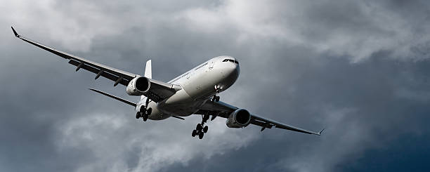 istock jet airplane landing in storm 136918923