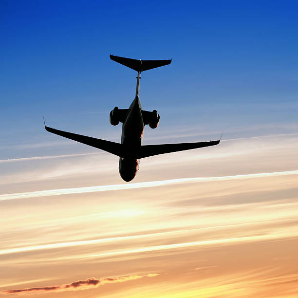 istock corporate jet airplane taking off at sunset 136918997