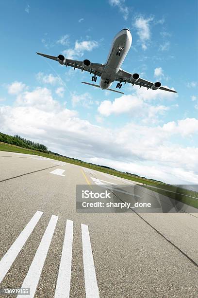 Xxl Jet Airplane Landing Stock Photo - Download Image Now - Airport Runway, Airplane, Landing - Touching Down