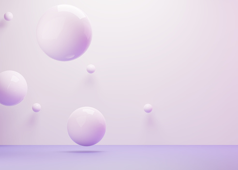 Pink 3D generated spheres floating in an empty room.