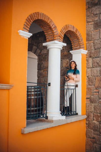 istock Beautiful Woman Exploring the Old Town 1369197462