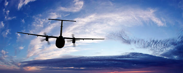istock propeller airplane flying at twilight 136919766