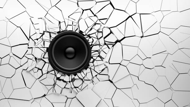 Black Hi-Fi speaker in broken and shattered white wall background