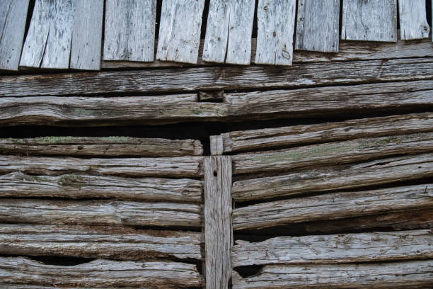 istock Old wooden planks wall texture background. 1369199920