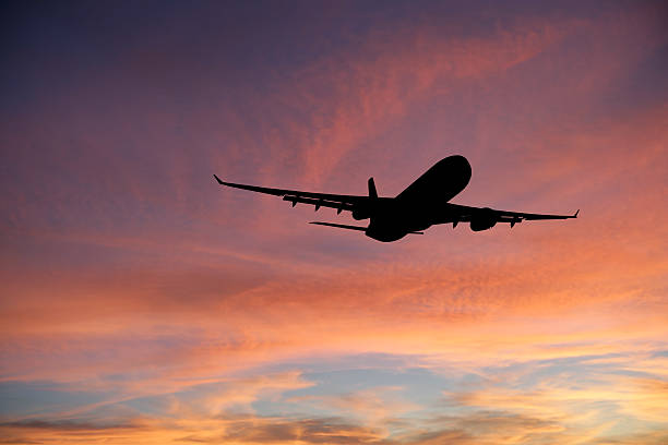 istock XXL jet airplane taking off at sunset 136920046
