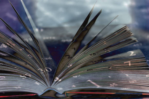 Opened magic book with sun and galaxy. Elements of this image furnished by NASA.