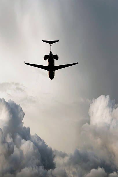 istock XXL corporate jet airplane flying in storm 136920290
