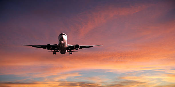 istock XXL jet airplane landing at sunset 136920350