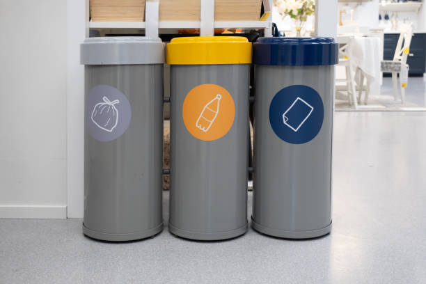 istock Garbage cans for separate garbage collection. Food waste tank, paper trash, plastic waste tank and metal can tank. The concept of environmental conservation 1369203631