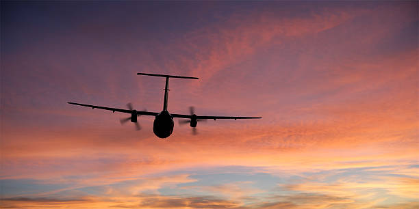 istock propeller airplane flying at sunset 136920382