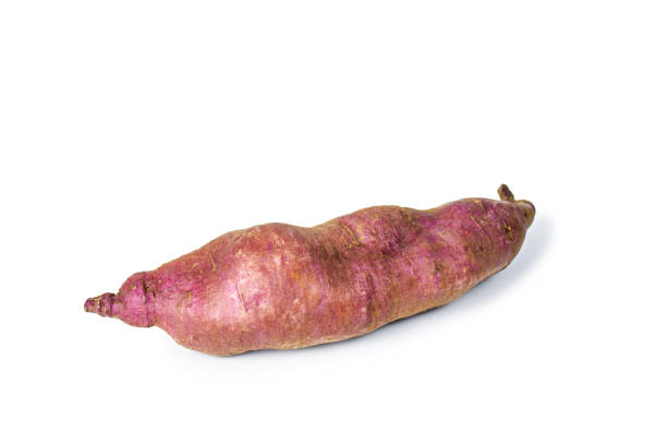istock Sweet potato close up on the white background 1369204520