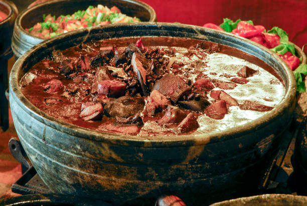 istock feijoada cooked in a wood stove with rice and farofa 1369204580