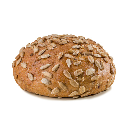 Bun with sunflower seeds, bread, fresh pastry isolated on white background