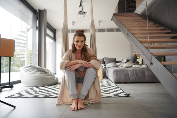 istock Pregnant woman at home 1369204875