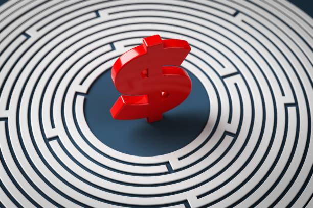 istock Red-colored dollar symbol and white circle-shaped maze. 1369204979