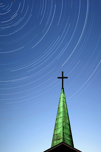 cross and church steeple with starry sky at twilight, vertical frame (XL)