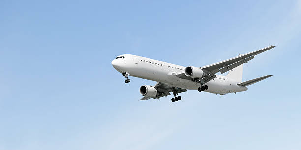 istock XXL jet airplane landing in bright sky 136920551