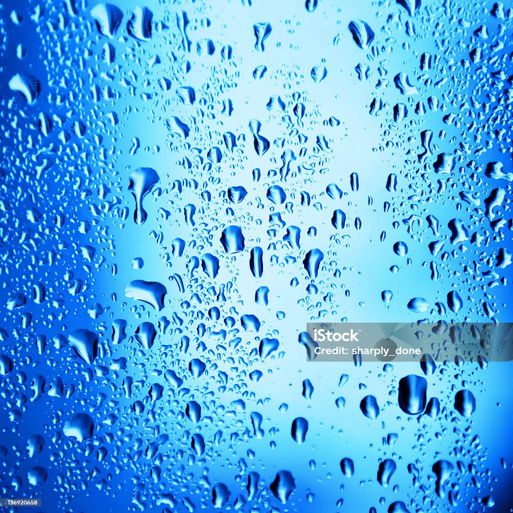 shiny blue raindrops shiny blue raindrops in close-up, square frame Abstract Stock Photo