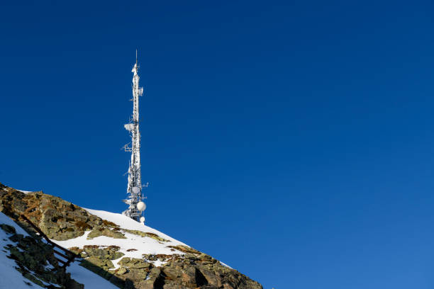 Frozen communication tower on top of a mountain. Vorarlberg, Montafon