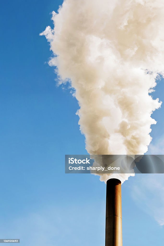 XXL air pollution thick white smoke with blue sky, vertical frame (XXL) Air Pollution Stock Photo