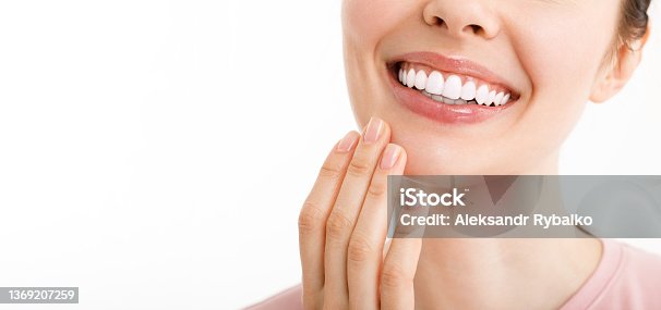 istock Perfect healthy teeth smile of a young woman. Teeth whitening. Dental clinic patient. Image symbolizes oral care dentistry, stomatology. Dentistry image 1369207259