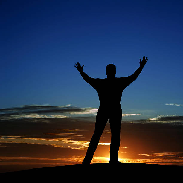 istock XL reverent man silhouette 136920751