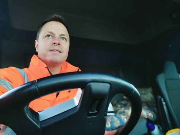 istock Male Truck Driver interior Portrait 1369208434