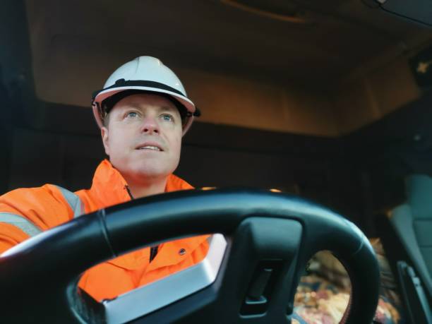 istock Male Truck Driver interior Portrait 1369208442