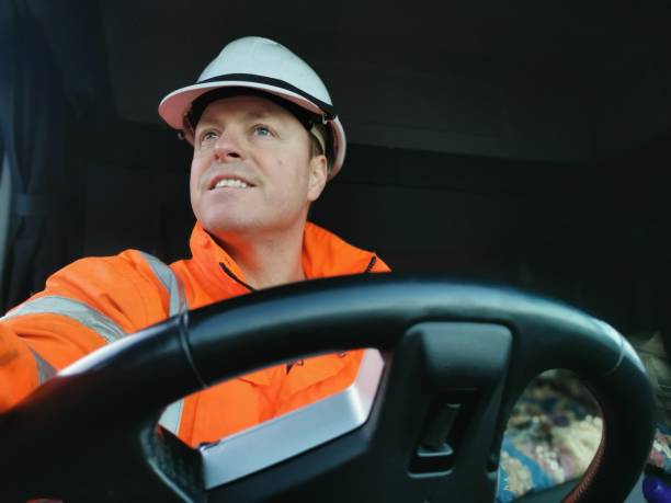 istock Male Truck Driver interior Portrait 1369208469