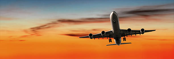 istock XL jet airplane landing at sunset 136920910