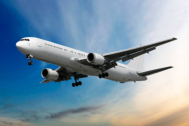 istock XXL jet airplane landing at dusk 136920950