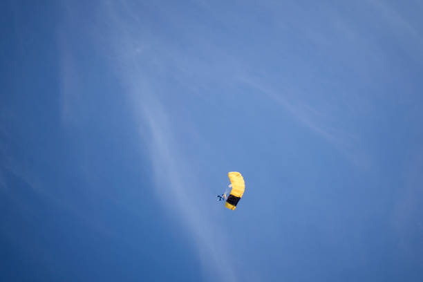 He flies through the sky, over the Swiss Alps