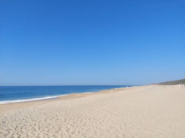 istock Calm waves at the beach 1369216029