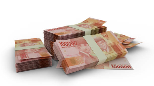 istock 3D Stack of 100000 Indonesian Rupiah notes isolated on white background 1369217742