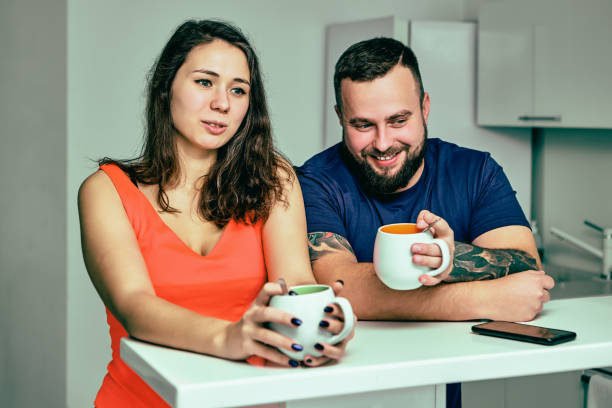 istock Employees are talking during coffee break in office. 1369217839