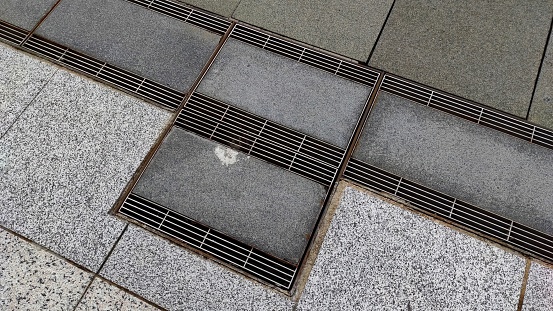 Sewer cover for sewer on street in city park