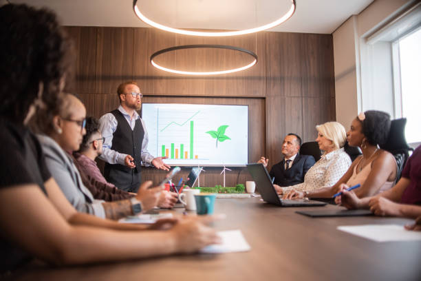 istock Businesspeople at a meeting on sustainability 1369232395