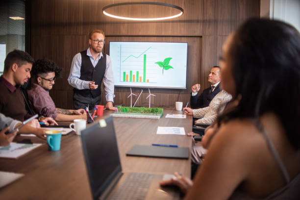 istock Businesspeople at a meeting on sustainability 1369232403