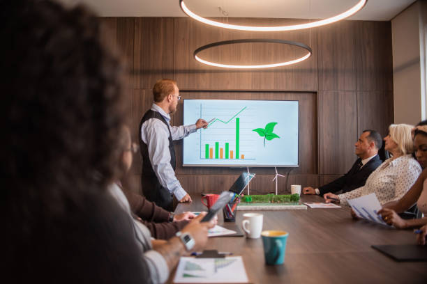 istock Businesspeople at a meeting on sustainability 1369232408