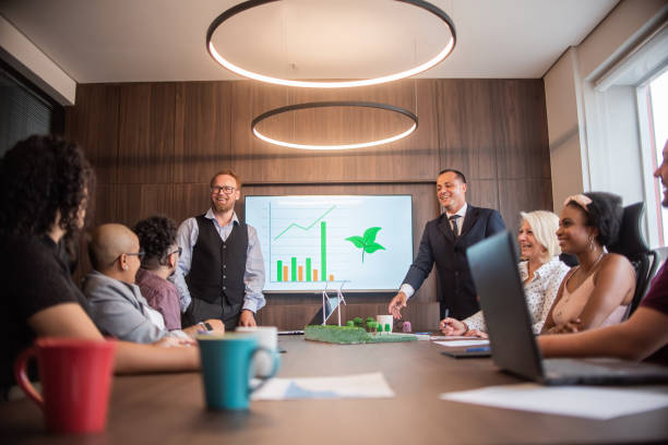 istock Businesspeople discussing about renewable sources 1369232456