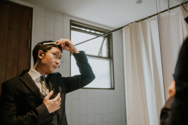 istock Businessman get ready in the morning. 1369236840